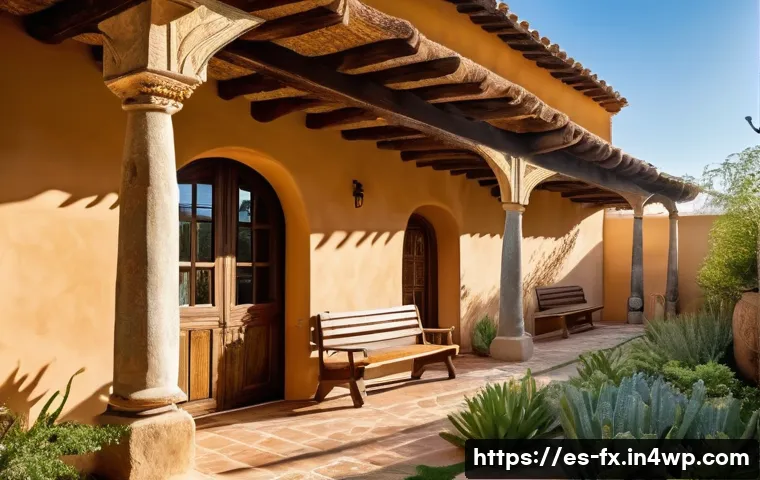 전통 건축의 현대적 사용 사례 - A traditional rural Spanish adobe house exterior bathed in warm golden sunlight, featuring thick ear...